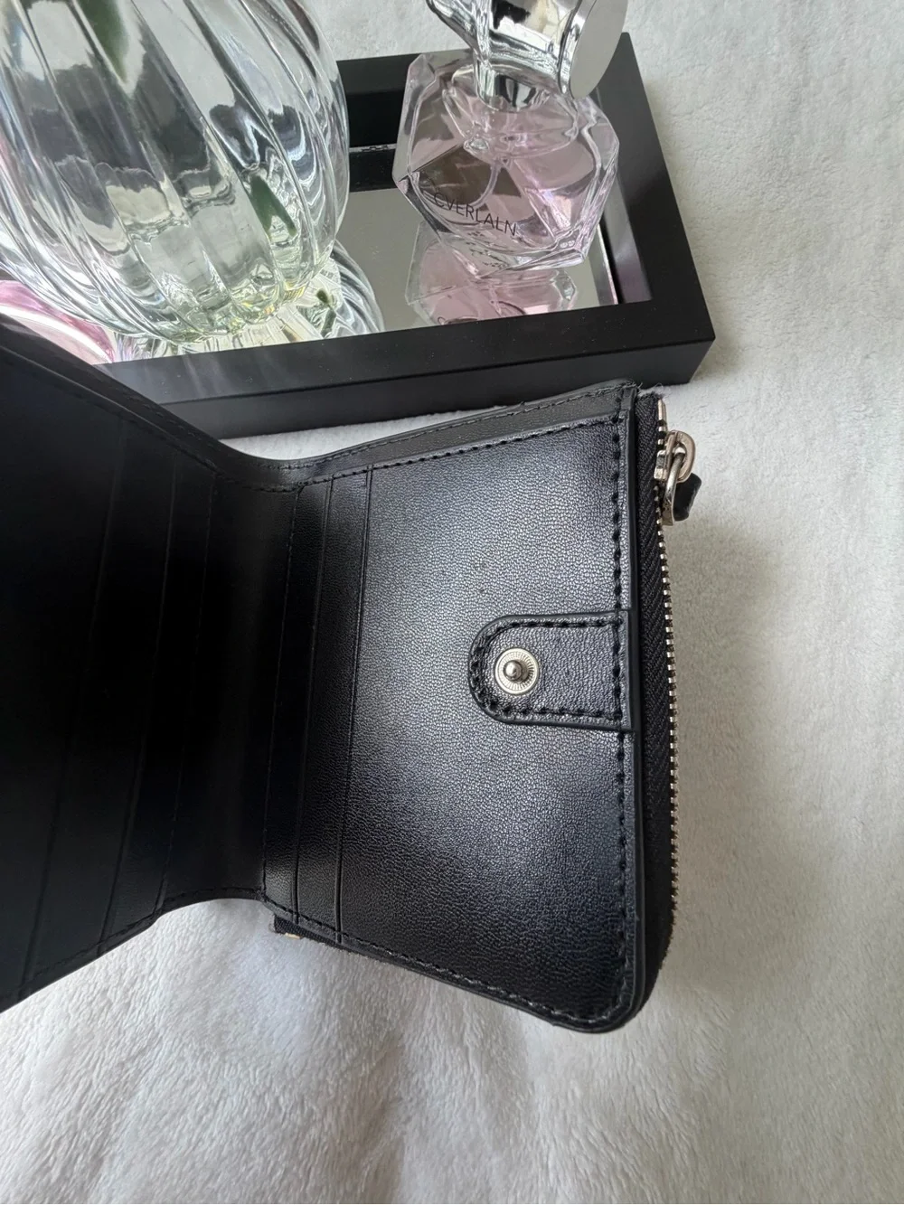 kate spade Black Pebbled Leather Zip Wallet with Gold Logo